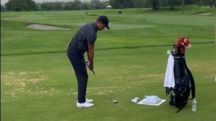 Tiger Woods hits balls in front of fans at 2022 Nexus Cup
